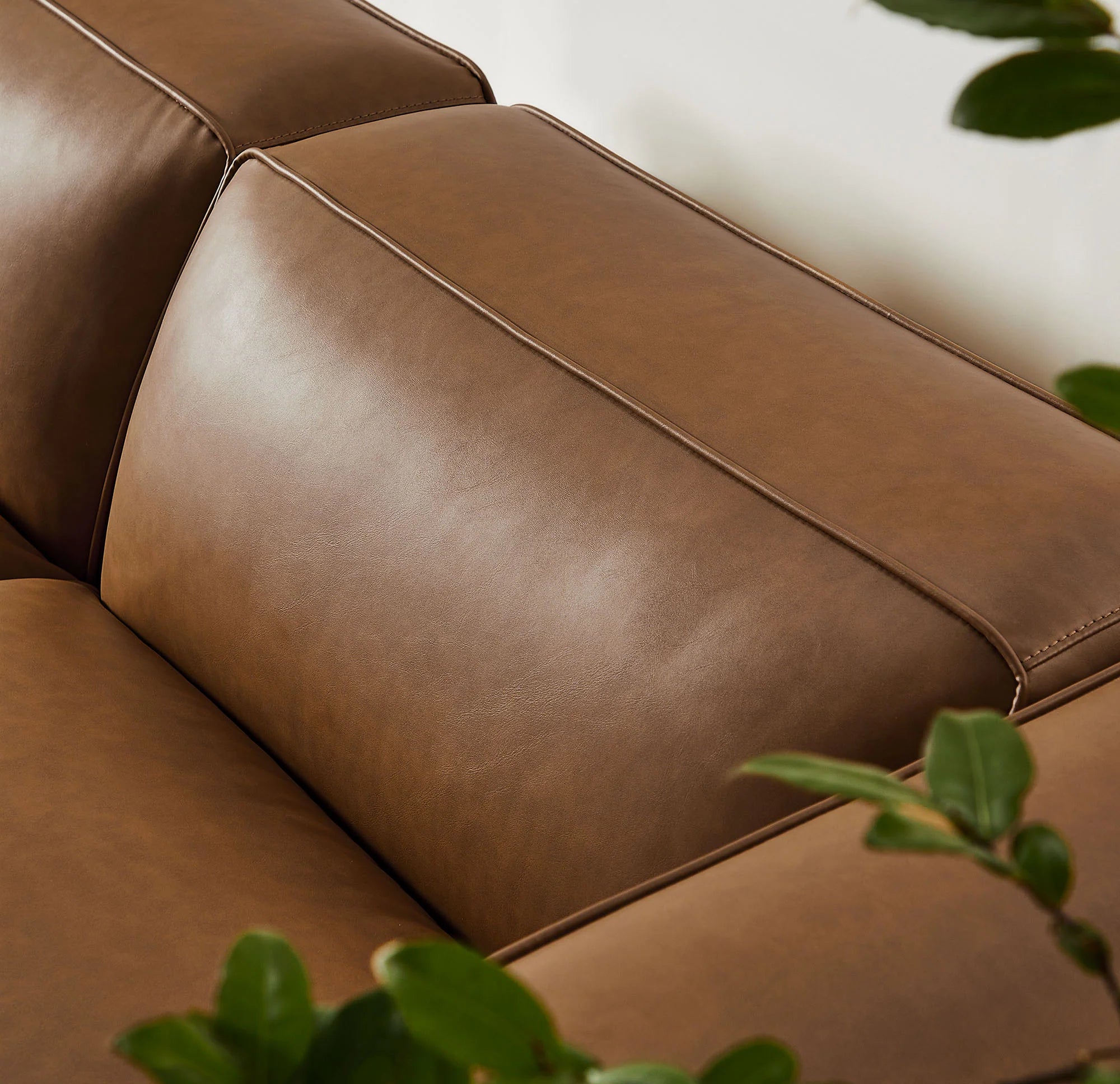 Auren 3-Piece Upholstered Vegan Leather Modular Loveseat with Ottoman in Coffee